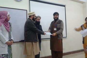 Dr Hamid presenting to Dr Ibrar